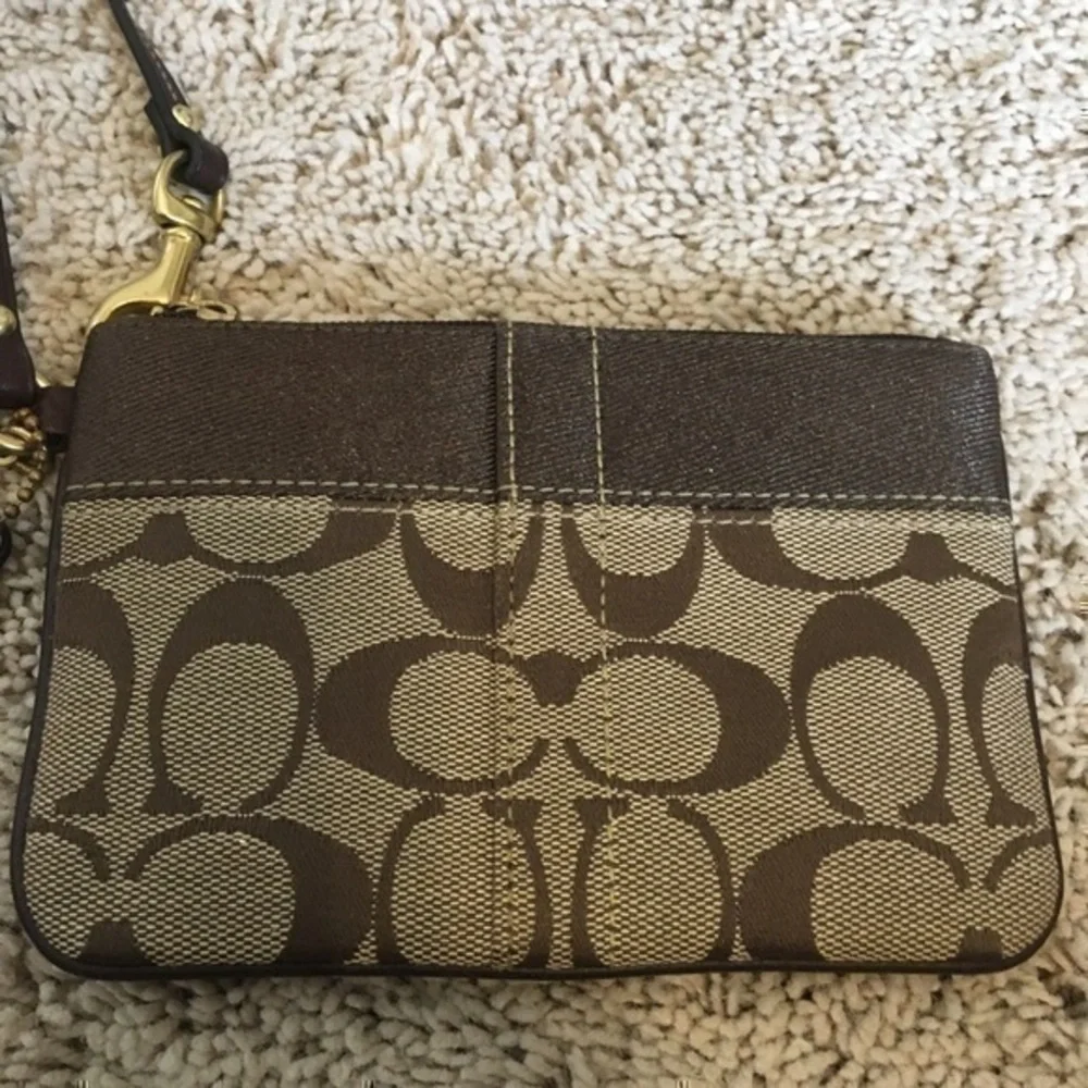 Coach Khaki signature stripe wristlet